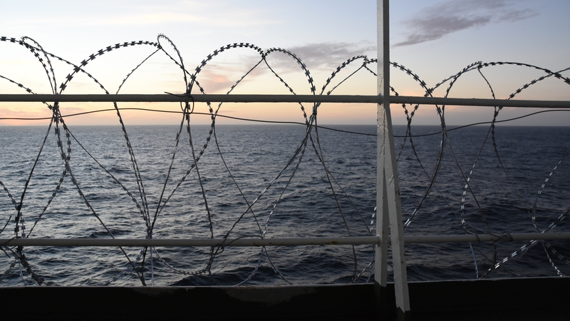 Barbed wire attached to a ship's railings to protect the crew against piracy attacks in the Gulf of Guinea