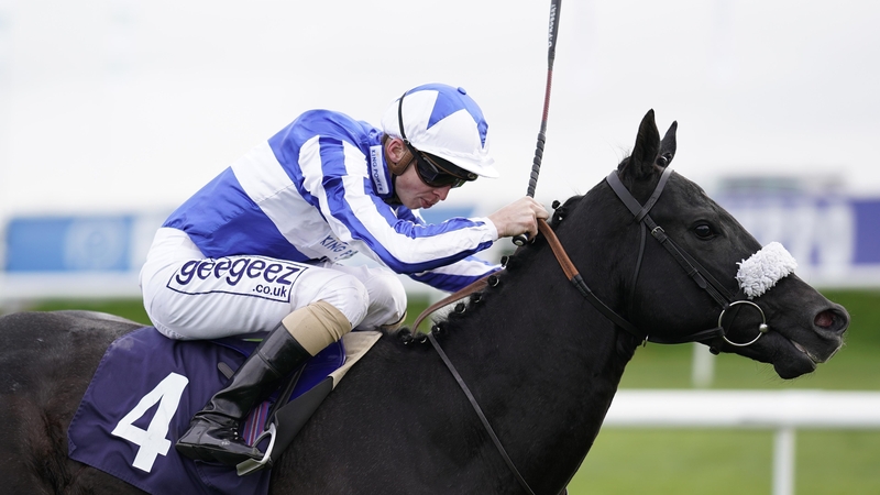 David Probert, pictured on stablemate Happy Power, guided Bangkok home on the Knavesmire