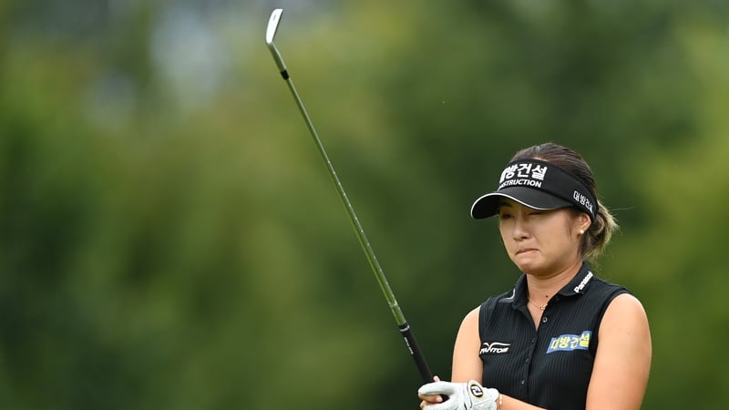 Jeongeun Lee6 of Korea lines up a shot during day three