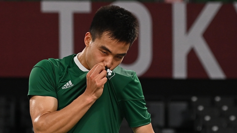 Nhat Nguyen kisses the Team Ireland logo after his victory