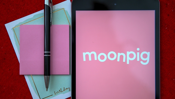 Moonpig today reported a lower first-half profit after a tough September and October in which its orders were hit by postal strikes at Royal Mail