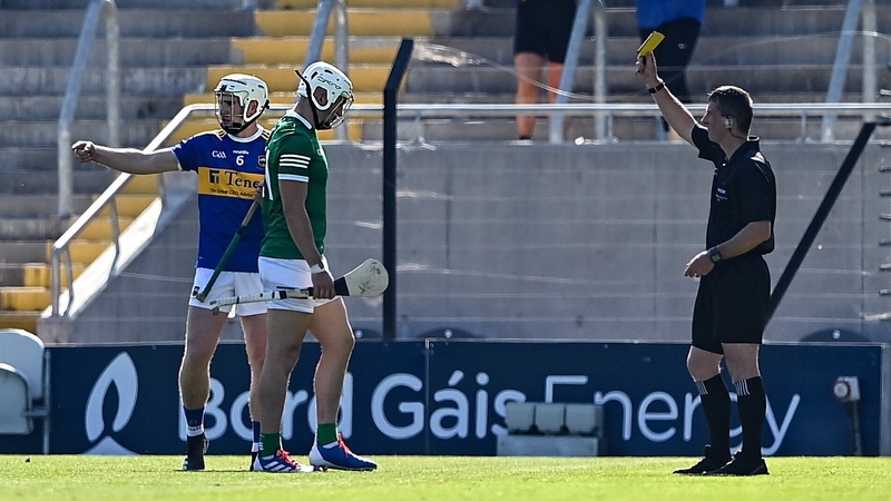 Aaron Gillane of Limerick is shown a yellow card by Paud O'Dwyer during the Munster final