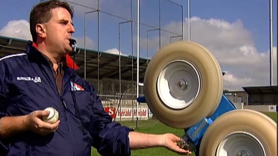 Michael Hearn operating the slíotar pitching machine (2006)
