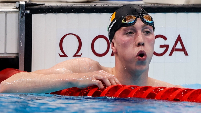 Wiffen looks at the clock after winning his heat