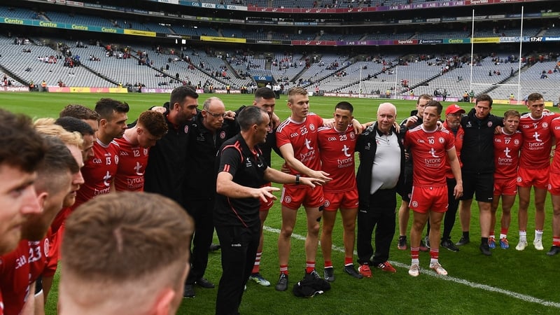 Joint-manager Brian Dooher speaking to his players after this Ulster final win last month