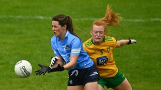 Lyndsey Davey of Dublin is tackled by Evelyn McGinley of Donegal