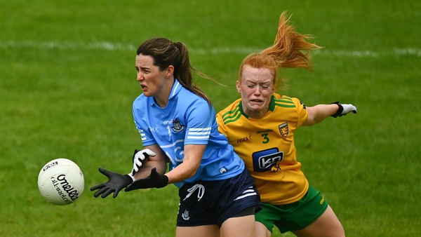 Lyndsey Davey of Dublin is tackled by Evelyn McGinley of Donegal