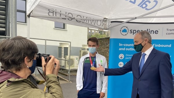 Taoiseach Micheál Martin with Olympic rowing champion Fintan McCarthy