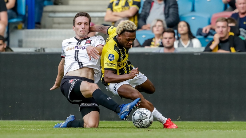Lois Openda of Vitesse is tackled by Raivis Jurkovskis of Dundalk