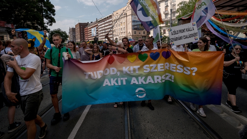Demonstrators march during the annual Pride parade on 24 July in Budapest, Hungary