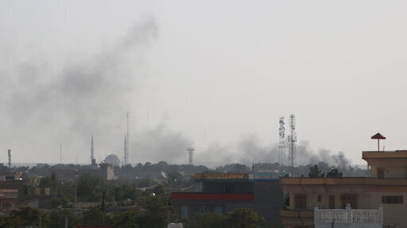 Smoke rising during gun fights in Shiberghan, capital of Jawzjan Province, Afghanistan
