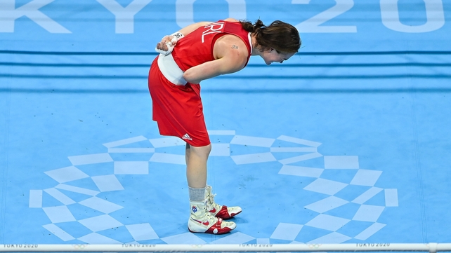 She acknowledges the crowd