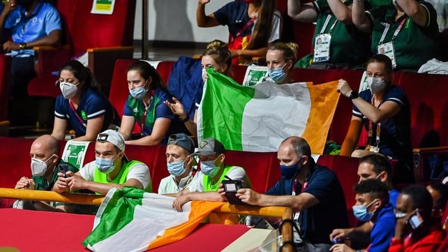 Her team-mates cheer her on