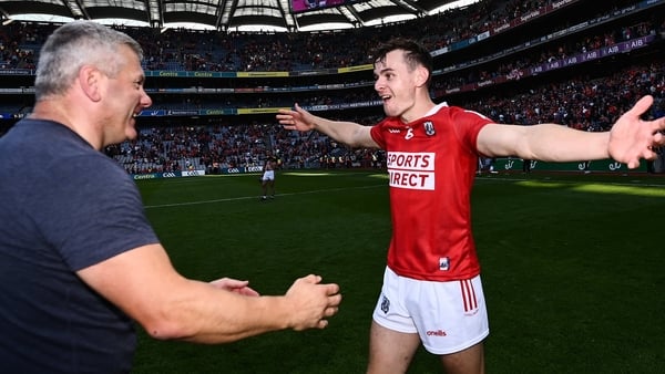 Cork's Mark Coleman (R) celebrates with selector Diarmuid O'Sullivan after beating Kilkenny