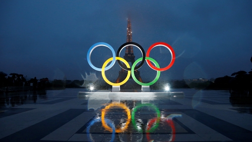 Olympic rings illuminate at place du Trocadero near the Eiffel Tower during the Paris 2024 Olympic bid victory