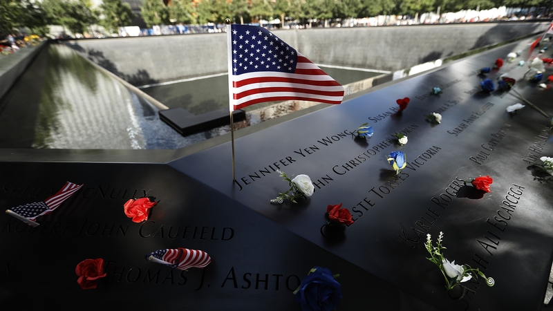 Flowers are left at the National 11 September Memorial in New York. The US is preparing to commemorate the 20th anniversary of the attacks