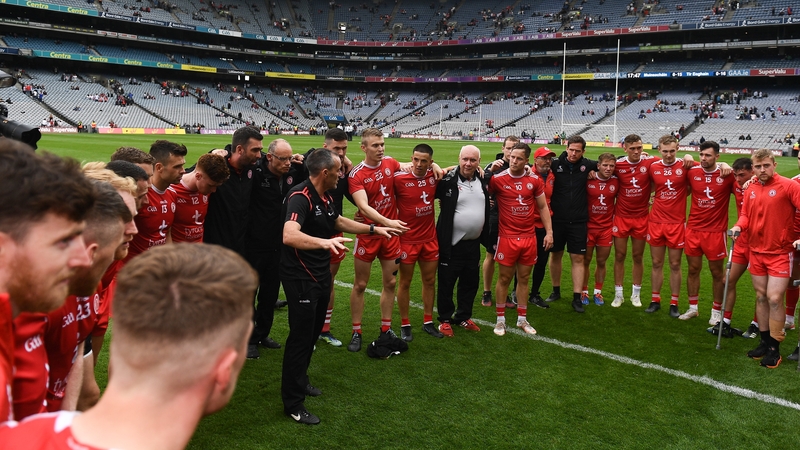 Tyrone joint-manager Brian Dooher speaking to the players after the win over Monaghan