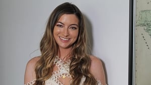 Meghan Scully, craoltóir.  show image