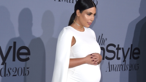 Kim Kardashian West (pictured at the InStyle Awards in Los Angeles in October 2015) - "I would sit at home and cry all the time"