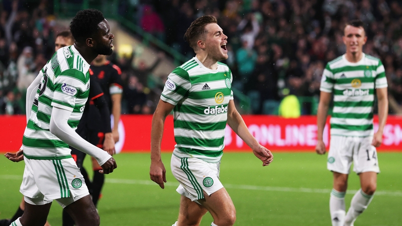 James Forrest celebrates after scoring Celtic's third goal