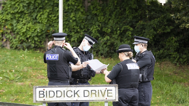 Police remain at the scene