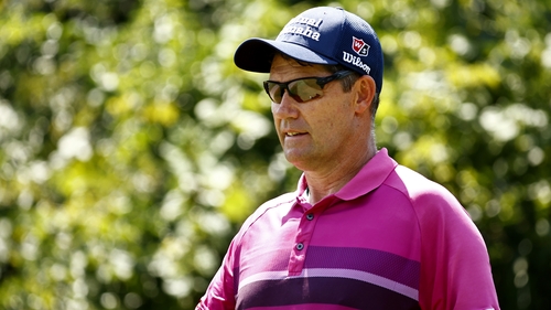 Harrington walks off the 16th tee during the second round