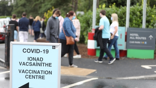 Adults and children queuing up at a vaccination centre in Citywest in Dublin today (via Rollingnews.ie)