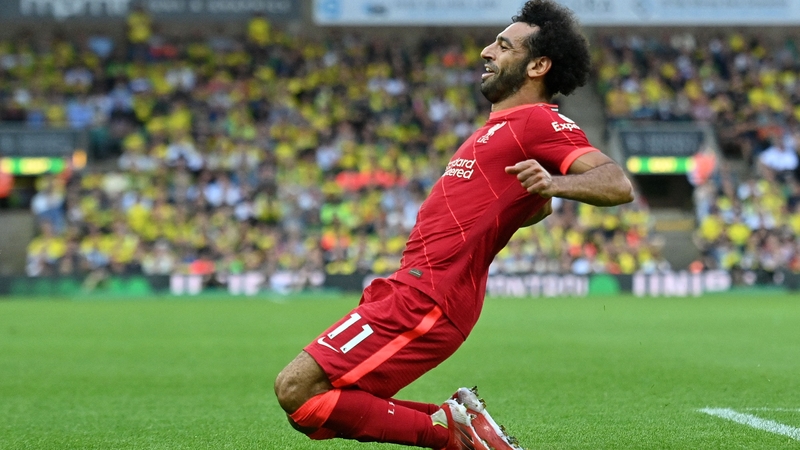Mo Salah celebrates scoring Liverpool's third goal