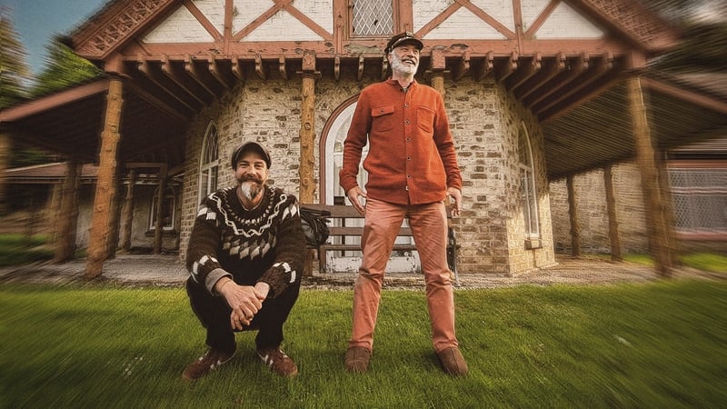 Myles O Reilly (L) and Ronan O Snodaigh (R) outside Shell Cottage