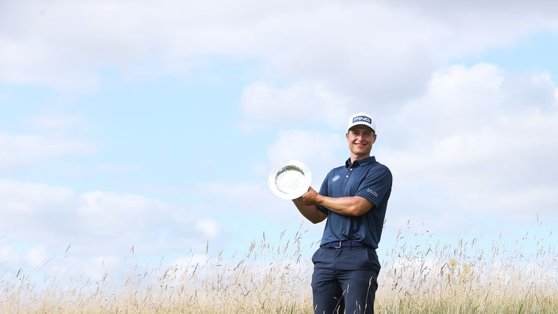 Calum Hill poses with the trophy