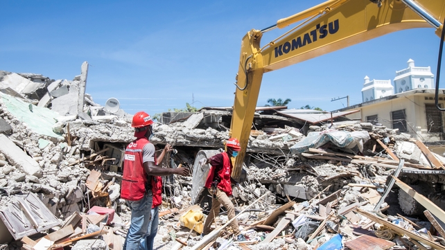 Personnel carry out debris removal, search and rescue work, in Les Cayes, Haiti