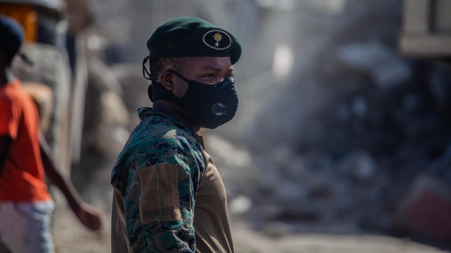 The work of recovering what materials can begins after a 7.2-magnitude earthquake struck Haiti