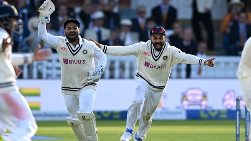 India celebrate the fall of the final English wicket at Lord's