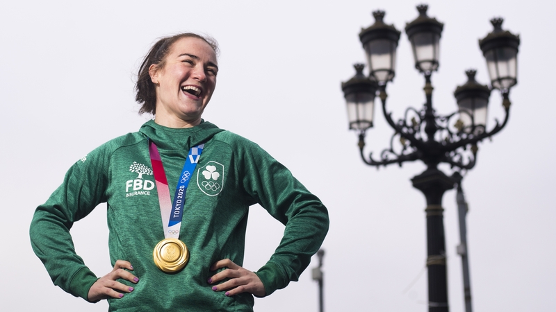 Olympic champion Kellie Harrington alongside a famous north Dublin landmark - the Five Lamps