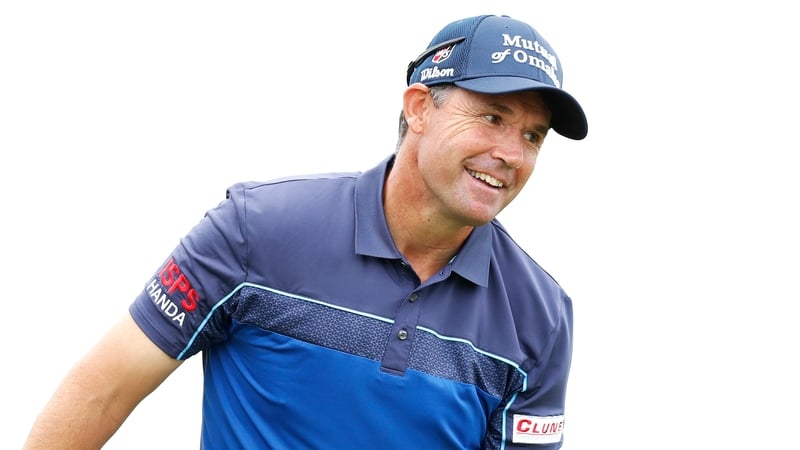 Harrington reacts after a shot on the 13th hole as he played alongside Henrik Stenson