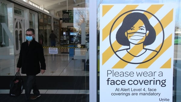 A sign urging people to wear facemasks before entering a shopping mall in Christchurch