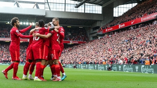 Liverpool celebrate Jota's first-half headed goal