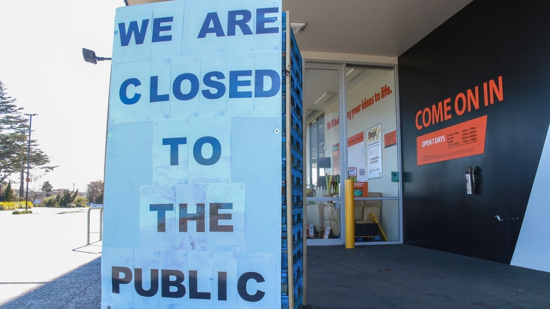 A sign seen outside construction supply company in Auckland, where New Zealand's current outbreak first emerged