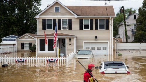 Forecasters warned of heavy rainfall and the risk of surging seas