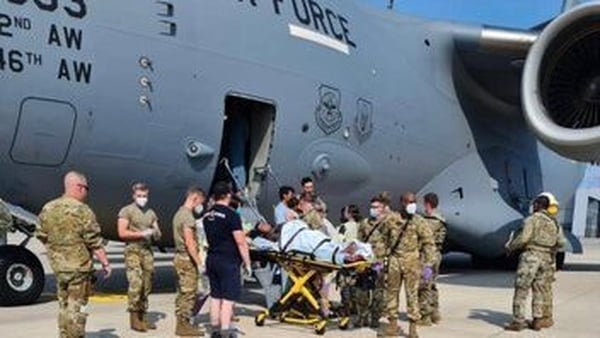 The woman went into labour on board the flight to Germany and began to experience complications