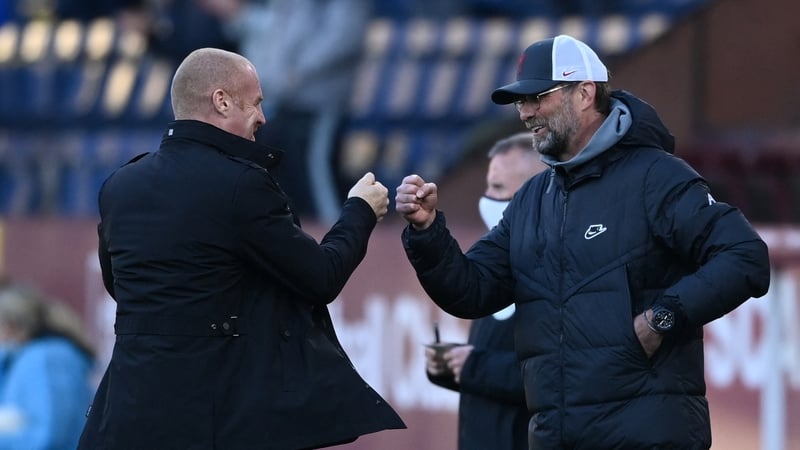 Sean Dyche (L) and Jurgen Klopp have opposing views on the Premier League sticking with three substitutes this season