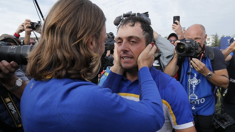 Tommy Fleetwood (L) congratulates Francesco Molinari Europe's Ryder Cup triumph in 2018
