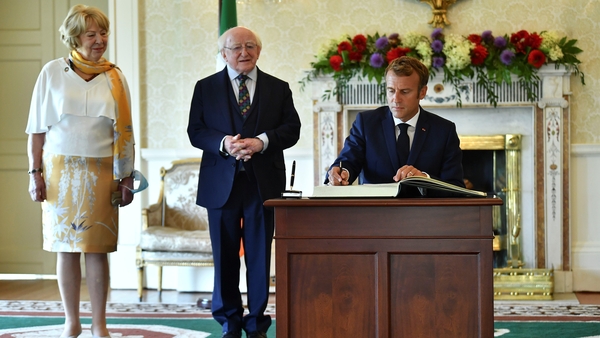 President Michael D Higgins and his wife Sabina welcome the French President to Ireland