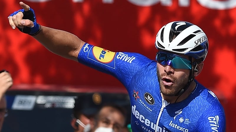 Florian Senechal celebrates as he wins the 13th stage