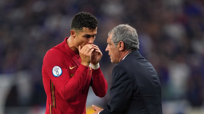 Cristiano Ronaldo talks with Fernando Santos during Portugal's 2-2 draw with France at Euro 2020