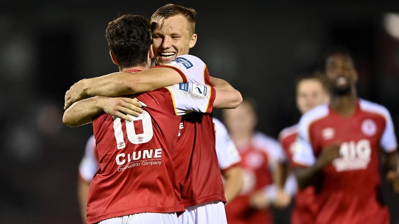 Alfie Lewis (16) ocelebrates with team-mate Jamie Lennon after scoring the decisive penalty