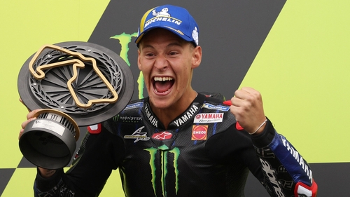 Fabio Quartararo celebrates on the podium