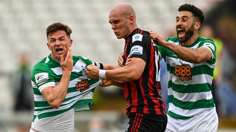 Ronan Finn (L) reacts after a flashpoint with Georgie Kelly