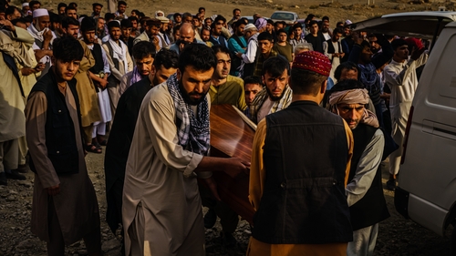 Mourners at the funeral of one of those killed in the drone strike