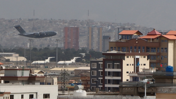 A military aircraft takes off at the Hamid Karzai International Airport in Kabul